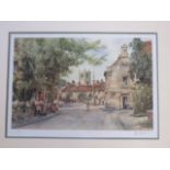After E. Sturgeon, a framed untitled print of a street scene together with a book of the artists