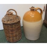 A & N.S Ltd storage jar contained in a wicker basket, together with C & J. Price, Bristol, cider