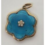 A Victorian marked 9ct gold turquoise guilloche enamel pendant piece, flower shaped and set with six
