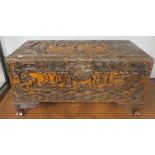 Ornately carved oriental small coffer, 36cm x 70cm x 35cm