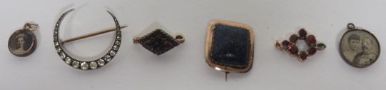 Two small Queen Victoria photograph pendant pieces together with an unmarked rose gold (tested)