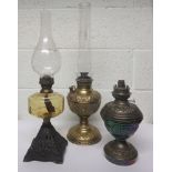 An American brass oil lamp, together with two Victorian oil lamps with all three lacking shades
