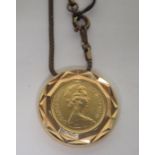 A possible gold half sovereign dated 1981, in a sealed back case and necklace chain