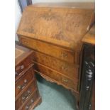 Walnut and burr walnut bureau with three drawers over cabriole legs, 107cm x 75cm x 43cm