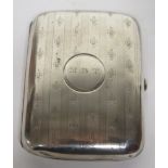 Silver cigarette case with the initials engraved to the front M.B.T, hallmarked for Birmingham,