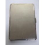 Silver cigarette case with engine turned design, hallmarked for Birmingham, 1946, weight 6.1ozt