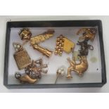 A collection of gold charms, with two marked 375, and three testing as 9ct, gross weight 10g,