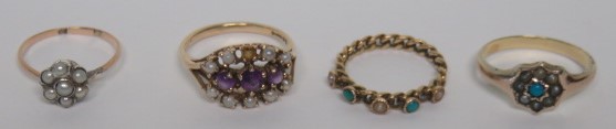 A marked 9.375 gold seed pearl and purple stone dress ring, ring size N, weight 2.8g, together