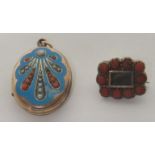 A 19th century (possibly Georgian) small mourning brooch set with ten round coral beads and a