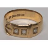 A hallmarked 18ct gold old cut diamond buckle ring, hallmarked for Birmingham 1876, ring size N,