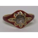 A gold diamond and red guilloche enamel ring, set with a central old rose cut diamond measuring