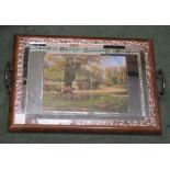 An oak tray with a hunting scene surrounded by mirrored glass, 55cm x 39cm