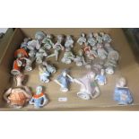 Collection of thirty ceramic dress dolls