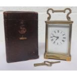 19th century brass and gilt carriage clock, with Roman Numeral dia and leather carrying case