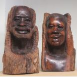 Pair of wooden carved busts of a man and a woman