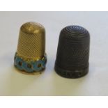 An unmarked gold (tested) thimble, weight 6.1g, together with a marked silver thimble, 3.7g