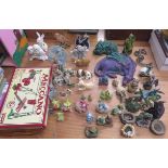Quantity of ornaments to include dragons, together with a meccano set etc