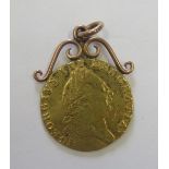 George III Gold Guinea on mounted scroll, possibly 9ct