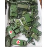 Collection of twenty-five unboxed Dinky Army Vehicles to include a military ambulance, a DKUW