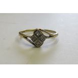 An art deco 18ct gold, platinum and diamond panel ring, faded hallmarks, with the panel measuring