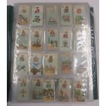 An album containing a large quantity of cigarette cards to include Carreras Fortune Telling Cards;