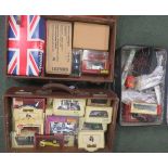 Quantity of boxed vehicles and railway toys contained in three leather boxes