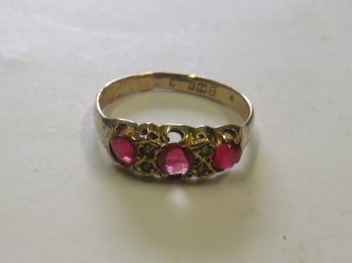 A 9ct rose gold ruby coloured glass and seed pearl dress ring, with faded Birmingham hallmarks, ring