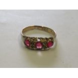 A 9ct rose gold ruby coloured glass and seed pearl dress ring, with faded Birmingham hallmarks, ring