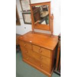 A mahogany chest of two short over two long drawers converted to a dresser with a swing mirror