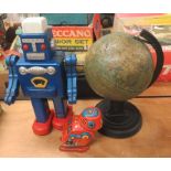 Tin plate robot, together with a tin plate bird, and a globe