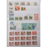 Stamp album containing a world mix of un mounted/mint and used stamps