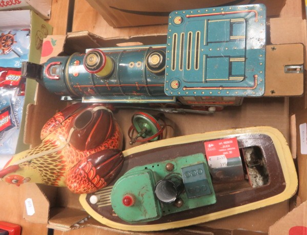 Quantity of tin plate toys to include a boat, a locomotive, a chicken etc