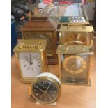 Quantity of clocks to include carriage clocks, together with a decorative tin