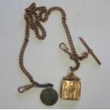 A marked 9ct rose gold Albert Chain, t-bar and square shaped photograph locket with an attached