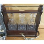 Tantalus with key together with three Royal Scot crystal decanters