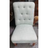 A modern upholstered nursing chair