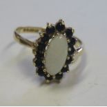 A marked 9ct gold opal and sapphire cluster ring, ring size N ½, weight 2.4g