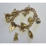 A rose gold curb charm bracelet, with rose gold heart padlock, with yellow gold/metal charms