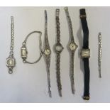 A collection of six vintage ladies cocktail watches to include a diamond accent steel watch and a