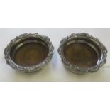 Pair of silver (tested) but un-hallmarked wine coasters, possibly Georgian