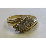 A marked 18ct gold diamond dress ring, ring size O, weight 4g