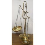 Set of brass scales with weights