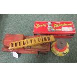 The Junior Sooty Xylophone together with a Triang tin plate toy and a tin plate fire engine