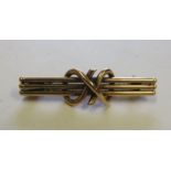 A marked 15ct gold triple bar brooch and knot twist brooch, the length 3.4cm, weight 2.3g