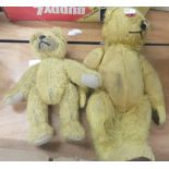 Vintage teddy bear together with a smaller vintage jointed teddy bear