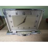 A vintage chromed Smith's mantel clock with 1953 presentation plaque