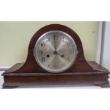 A mahogany veneered mantel clock