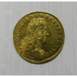 A fascimile gold 1716 George I half guinea, weight 3.47g. Tests as gold.