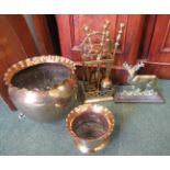 Quantity of brass including fire companion set, 2 brass planters and a nice old door stop in the
