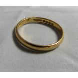 A marked 22ct gold band ring, size O 1/2, weight 3.5g